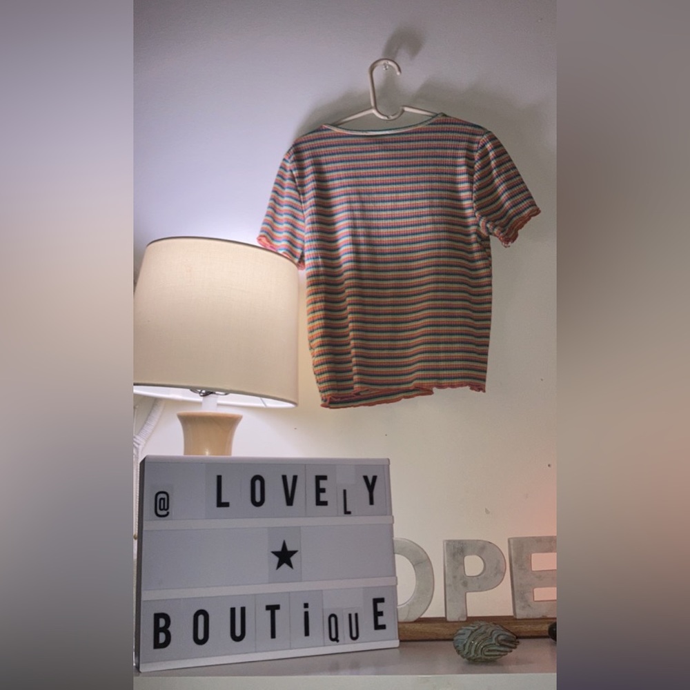 Cute vibrant rainbow T-shirt. Pair with jeans to look real cute to!🤭💗